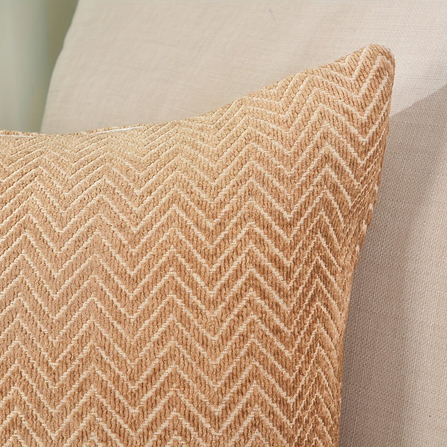 These 18x18 inch decorative pillow covers are Herringbone chenille gold, featuring a simple and elegant pattern that serves as the perfect accent for any room.