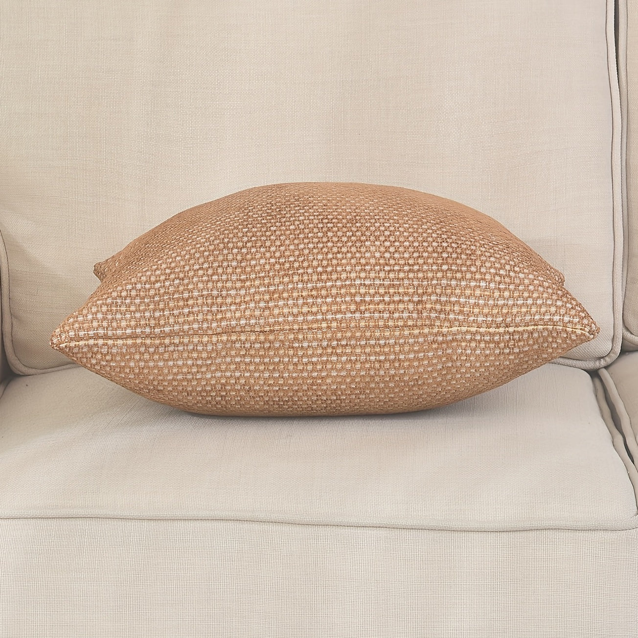 Dotted chenille fabric, gold，offers a set of two decorative throw pillow covers featuring Simple and elegant dot pattern design. These cushion covers measure 18 by 18 inches, providing a perfect accent for your living space.
