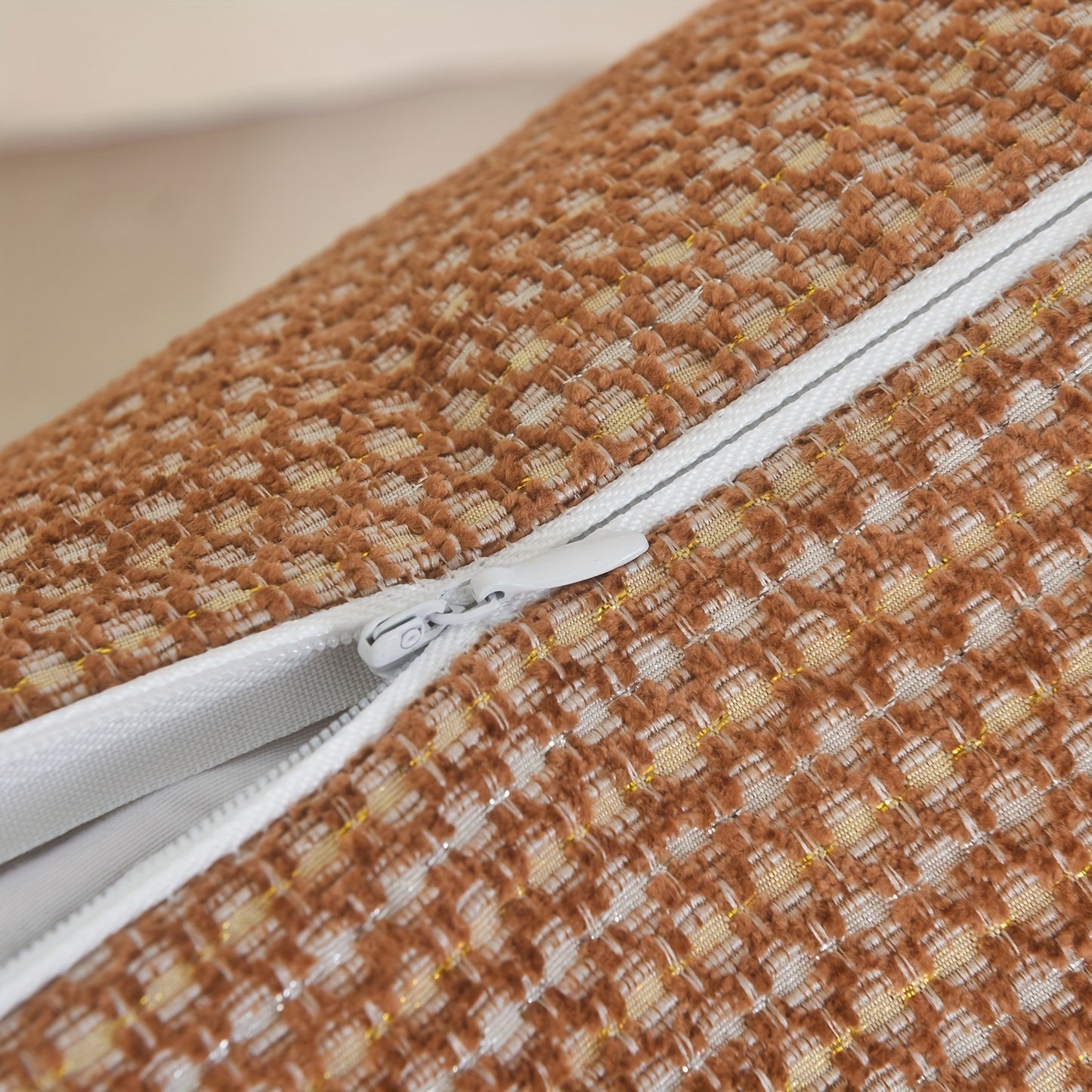 Dotted chenille fabric, gold，offers a set of two decorative throw pillow covers featuring Simple and elegant dot pattern design. These cushion covers measure 18 by 18 inches, providing a perfect accent for your living space.